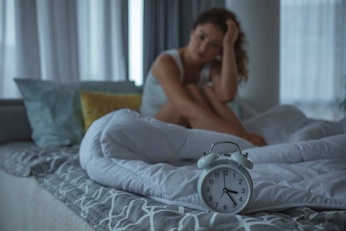 donna a letto stanca
